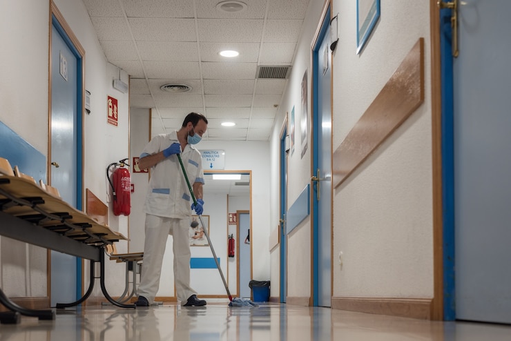 cleaning personnel carrying out disinfection hygiene work premises